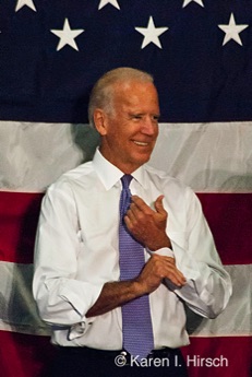 Vice President Joe Biden rolls up his sleeves