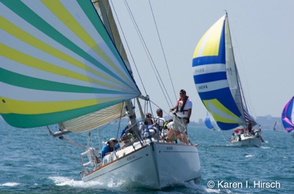 Sailboats with spinnakers at start of Race to Mackinac
