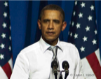 President Barack Obama with American flags behind him