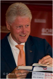 President Bill Clinton signing his books