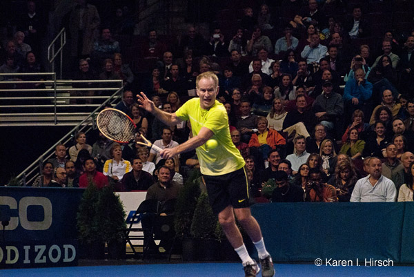 John McEnroe playing tennis - backhand